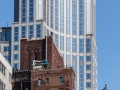 The distinctive concave face towers over the intersection of E 57th Street and Lexington Avenue.