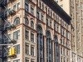 The seven-story Ahrens Building is wrapped by the 17-story Lafayette Hall (NYU residence hall).