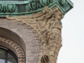 Two terra cotta angels support the cornice on the Nassau Street facade - helped by lots of iron straps.