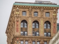 The building's crown is of colorful terra cotta.