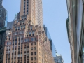 A slender tower above the terra cotta-edged setbacks.