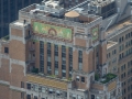 Faience (glazed terra cotta) friezes decorate the crown - hiding water tank and mechanical installations.