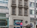 A puzzling projection - Greek elements tacked on to a postmodern building. Can't figure out why.