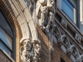 Grotesques and other decorative elements at the 12th/13th floors.