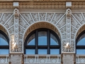 Rich terra cotta sixth floor looks almost like carved ivory.