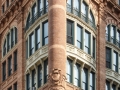 Brick, red granite and terra cotta make up the facade.