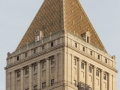 The pyramidal roof is clad in gilded tile.