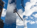 Interesting play of clouds and sky against the mirror facade.