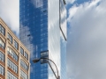 Interesting play of clouds and sky against the mirror facade.