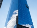 Interesting play of clouds and sky against the mirror facade.