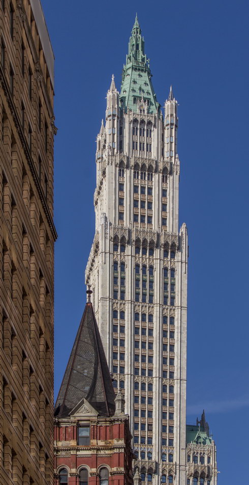Color in the spandrels (decorative panels above/below each window) enhance the tower's vertical lines.