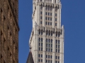 Color in the spandrels (decorative panels above/below each window) enhance the tower's vertical lines.